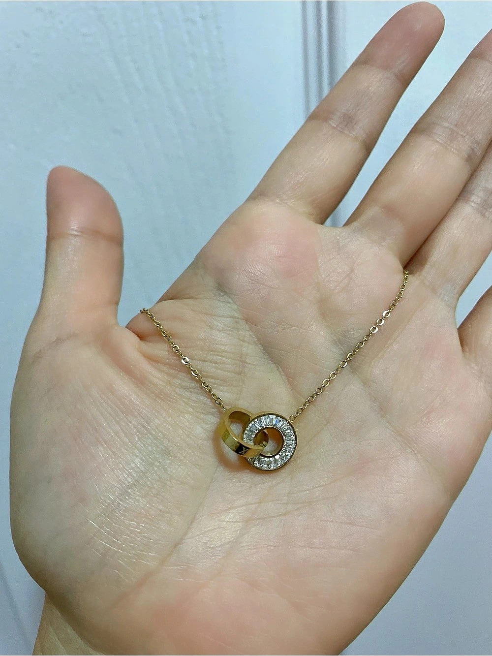 Interlocking Ring Pendant Necklace in Gold & Silver
